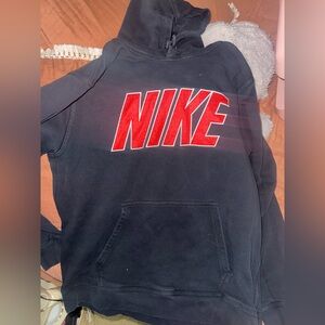 Nike Hoodie with Vibrant Red Accents